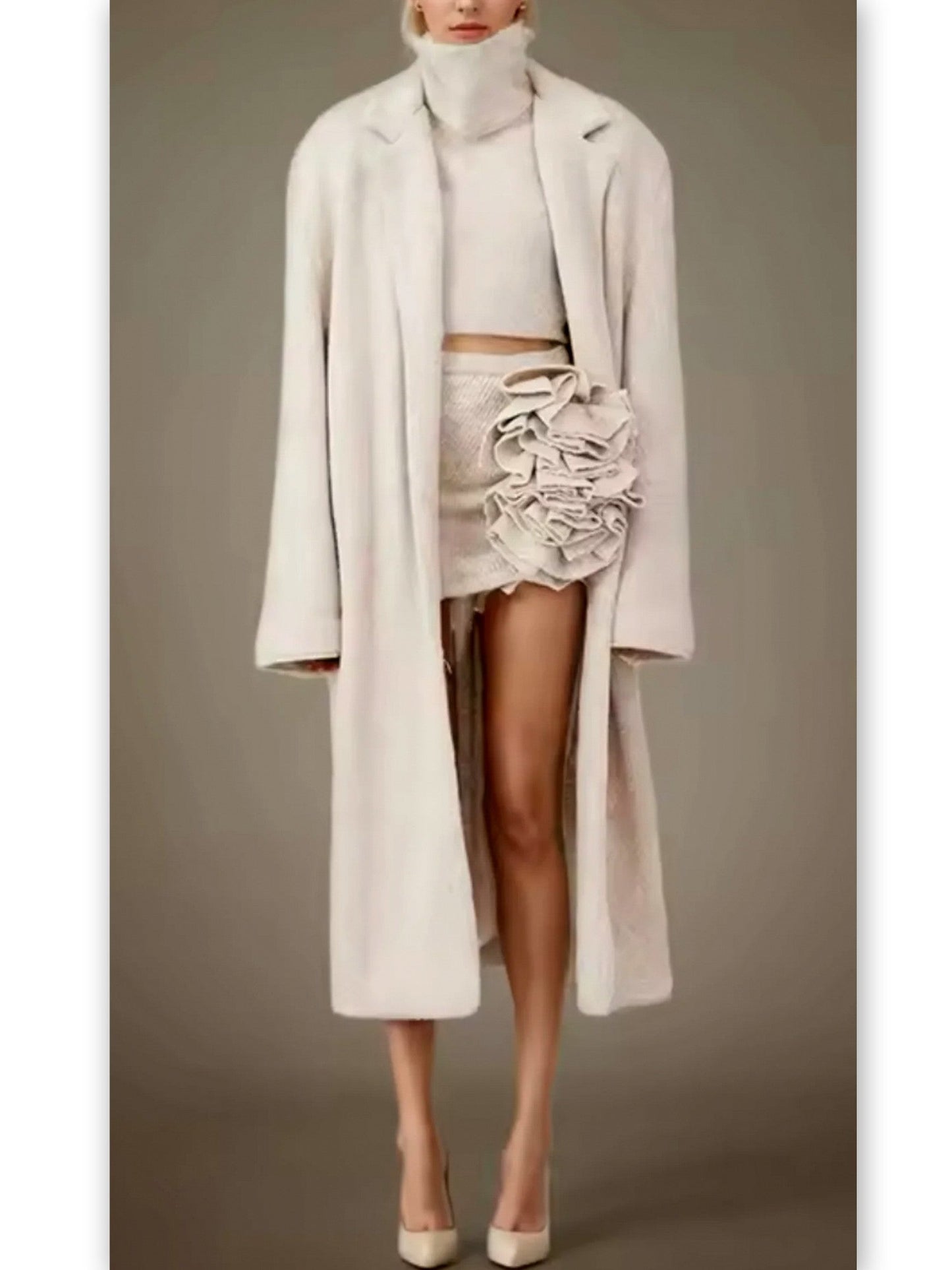 Cozy knitwear ensemble featuring a sleeveless turtleneck and flower applique skirt