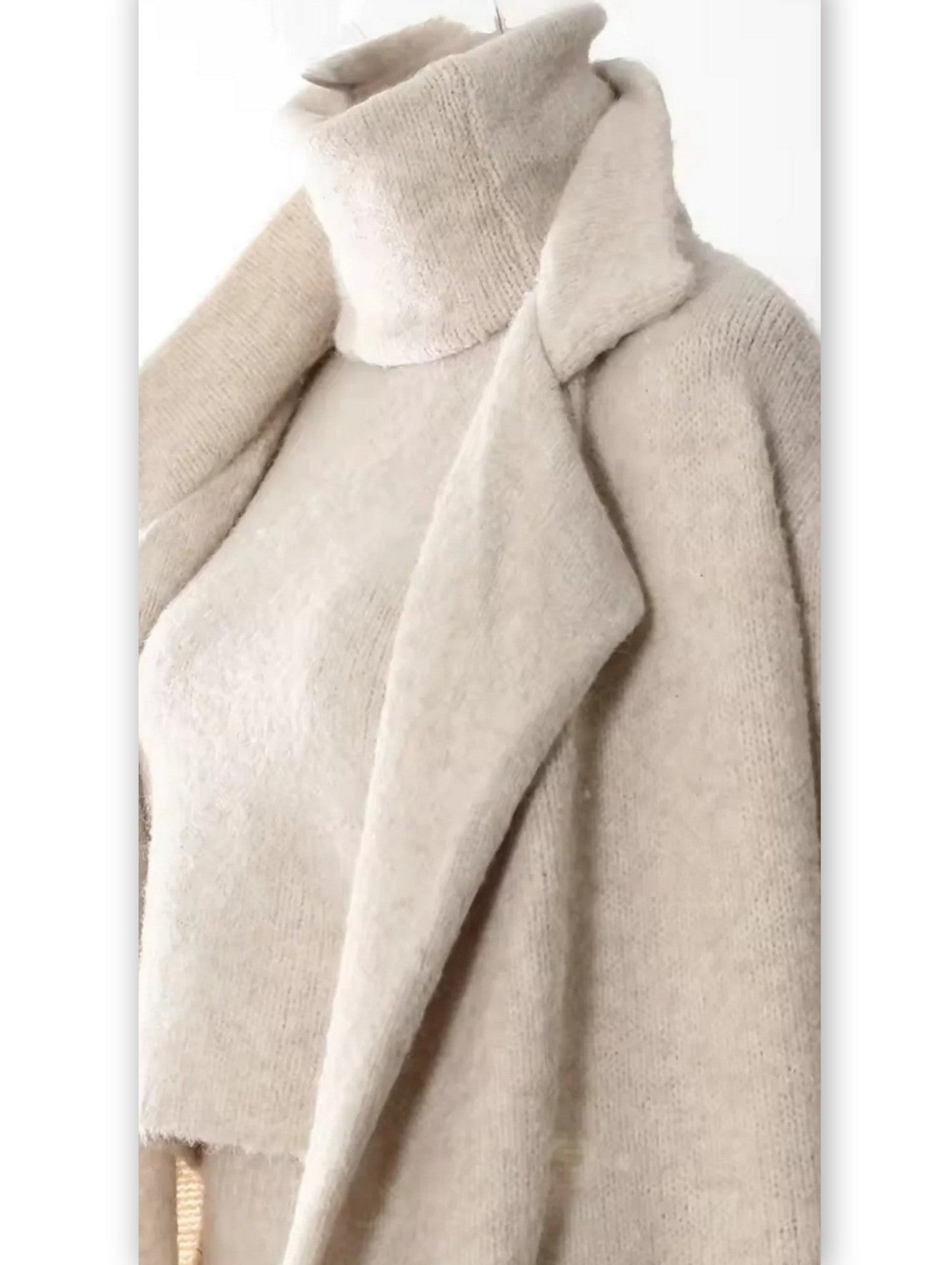 Cozy knitwear ensemble featuring a sleeveless turtleneck and flower applique skirt