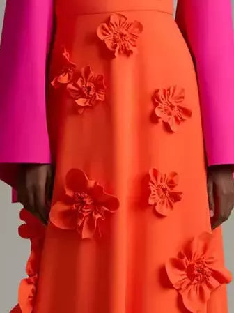Orange V-neck flared-sleeve gown with floral color-contrast and pink sleeves