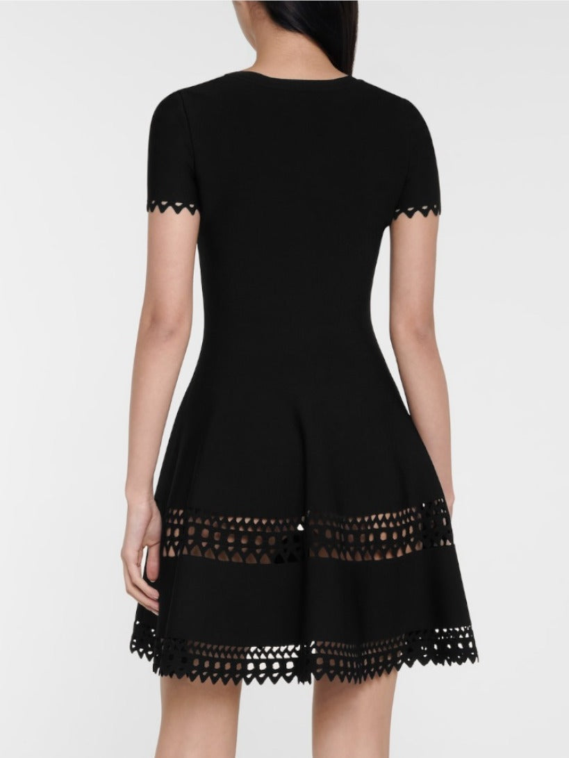 Black fit-and-flare A-Line Cut-Out Stretch Knit Mini Dress with lace trim