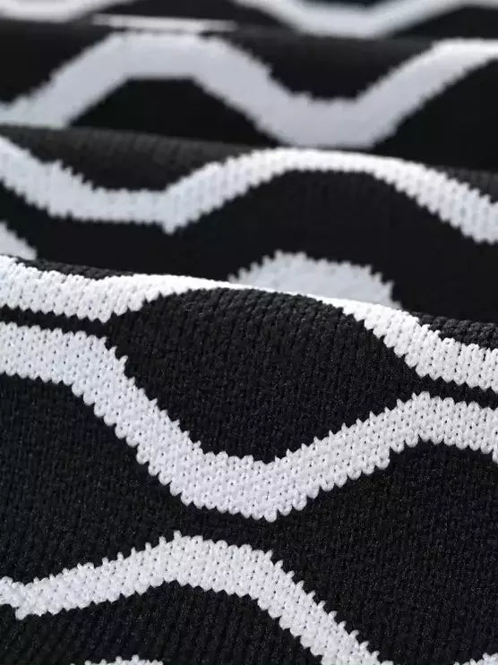 A-Line Knit Geometric Print Mini Dress featuring a stylish black and white pattern