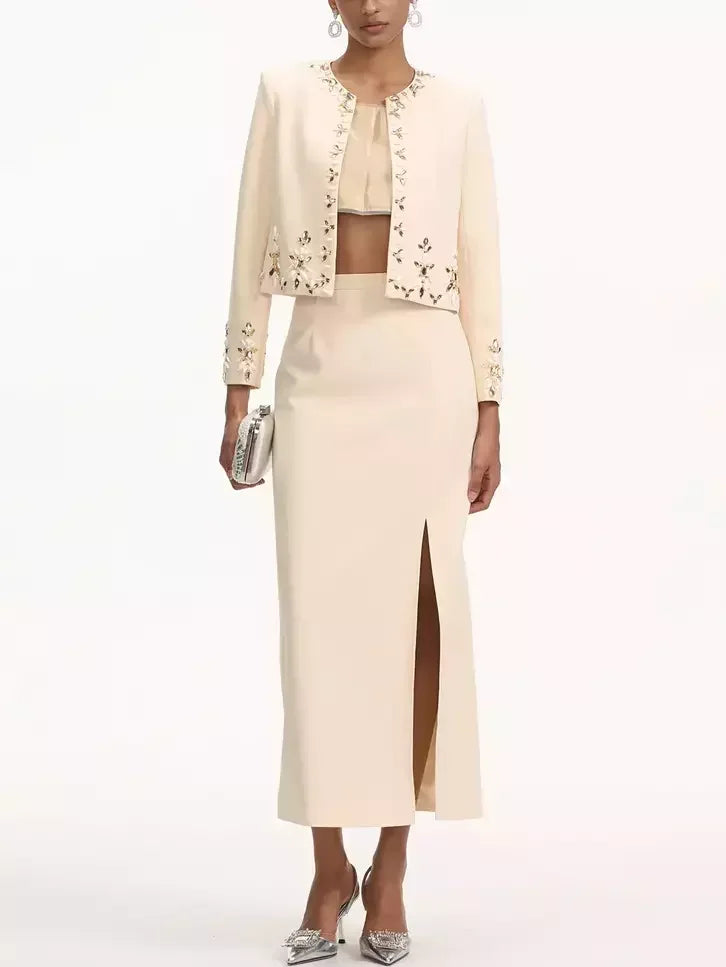 Cream-colored Branna Couture skirt set with bead-embellished cropped jacket