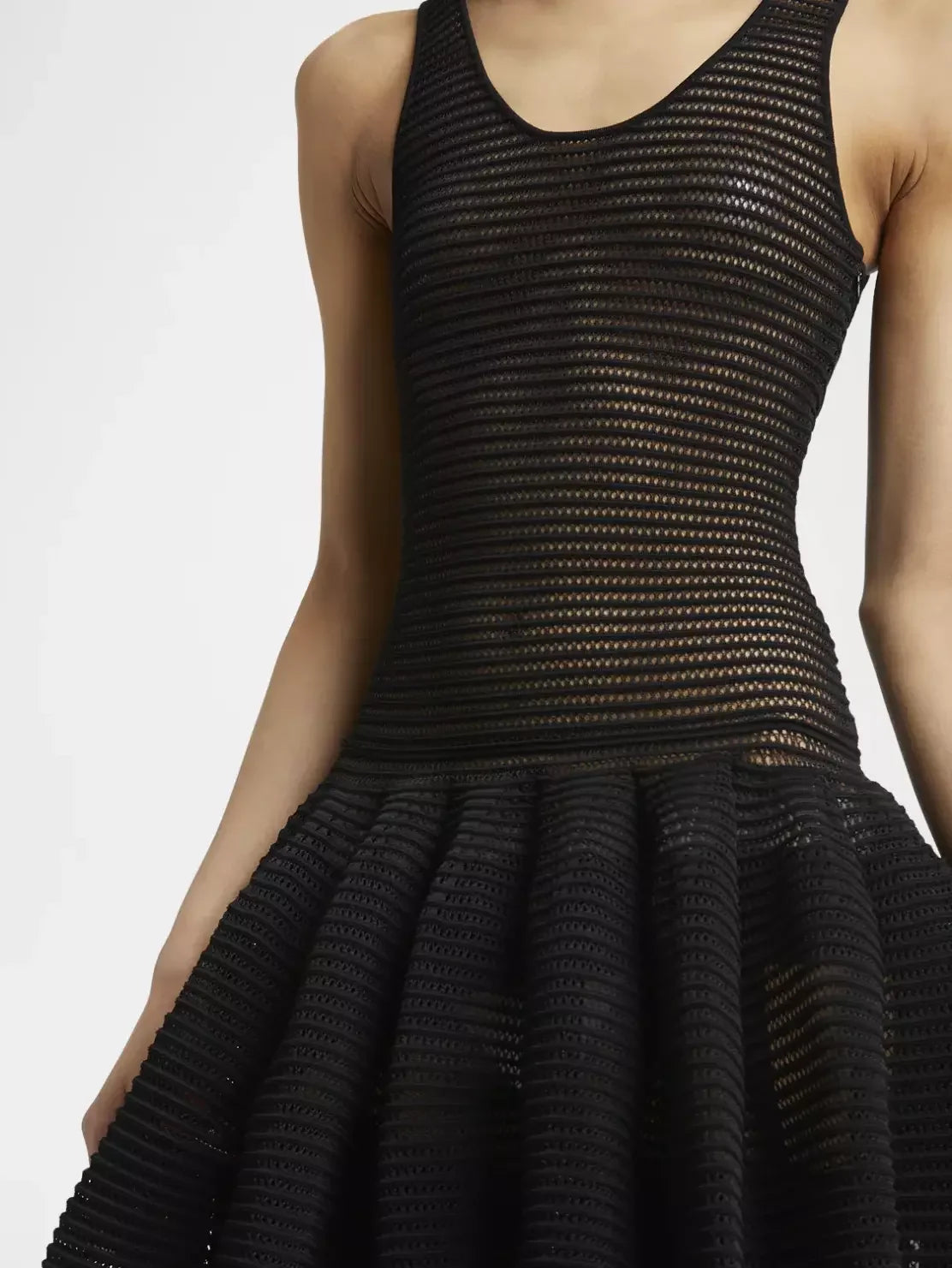 Black Crinoline Knit Dress with Under Slip featuring a knit tank top and pleated skirt