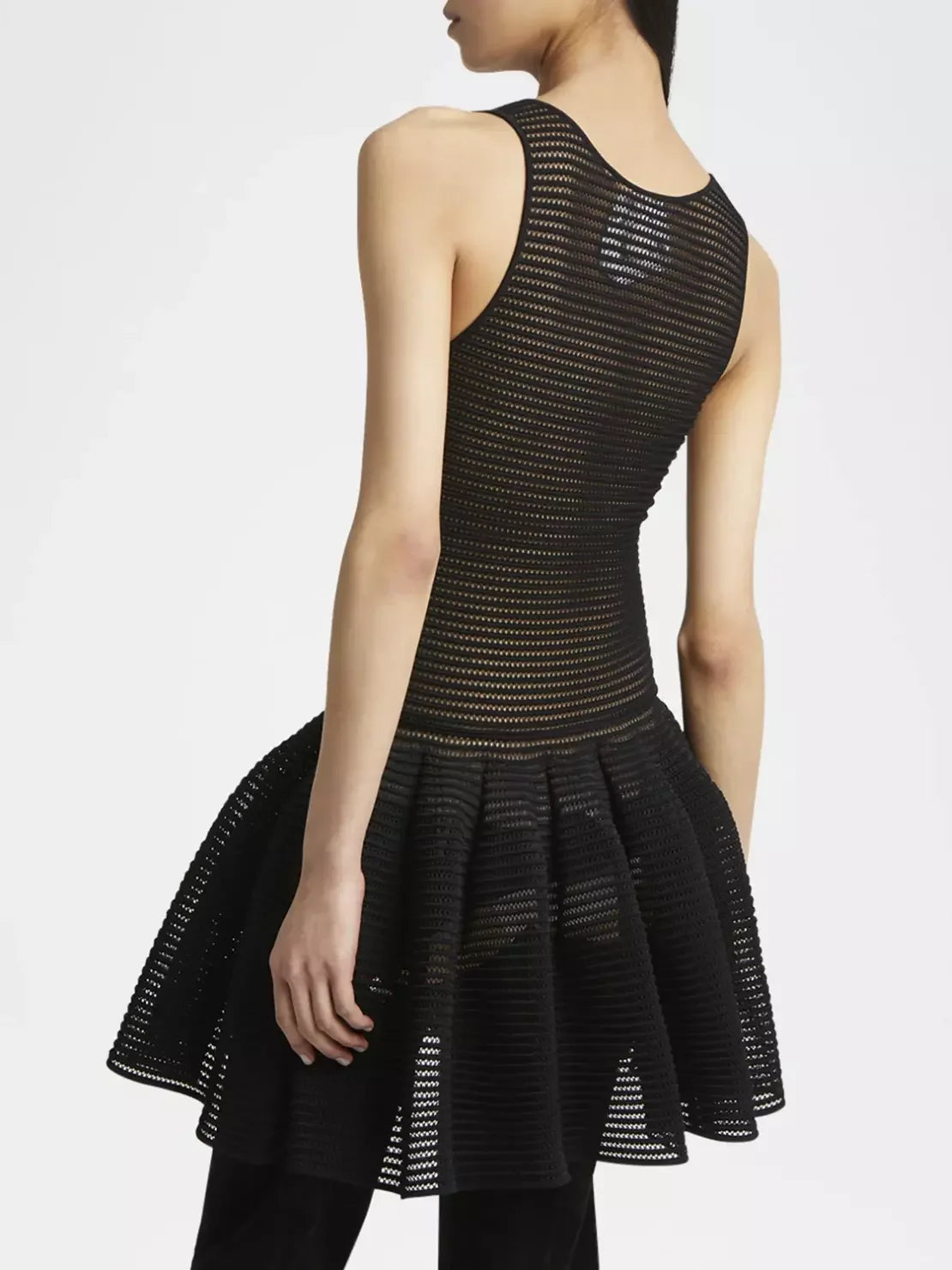 Stylish Black Crinoline Knit Dress with Under Slip showcasing a trendy mesh design