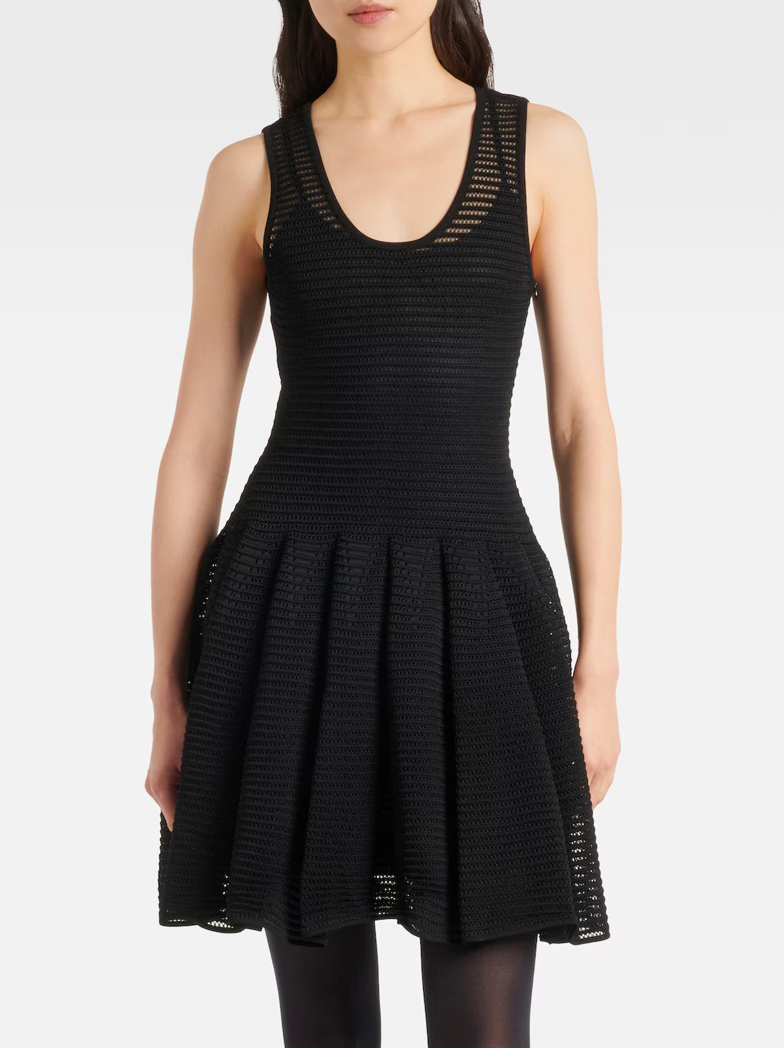 Black Crinoline Knit Dress with Under Slip featuring a stylish skater silhouette