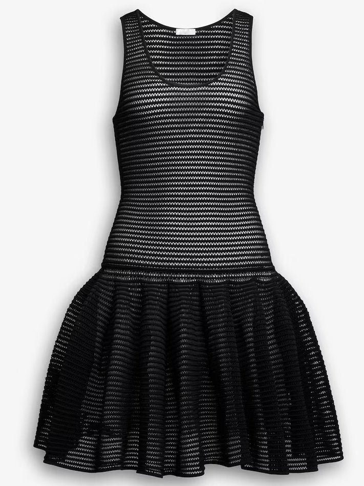 Black Crinoline Knit Dress with Under Slip featuring a stylish skater silhouette