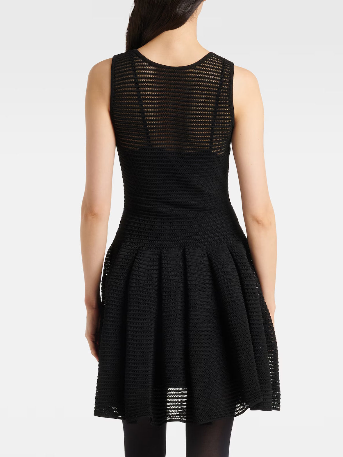 Black Crinoline Knit Dress with Under Slip showcasing a stylish sleeveless design