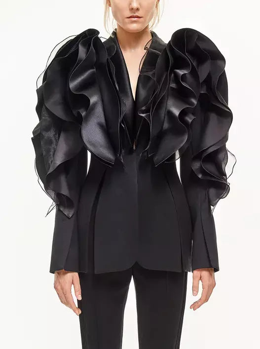 Black Tiered Ruffled Tuxedo Jacket showcasing elegant ruffled design and stylish fit