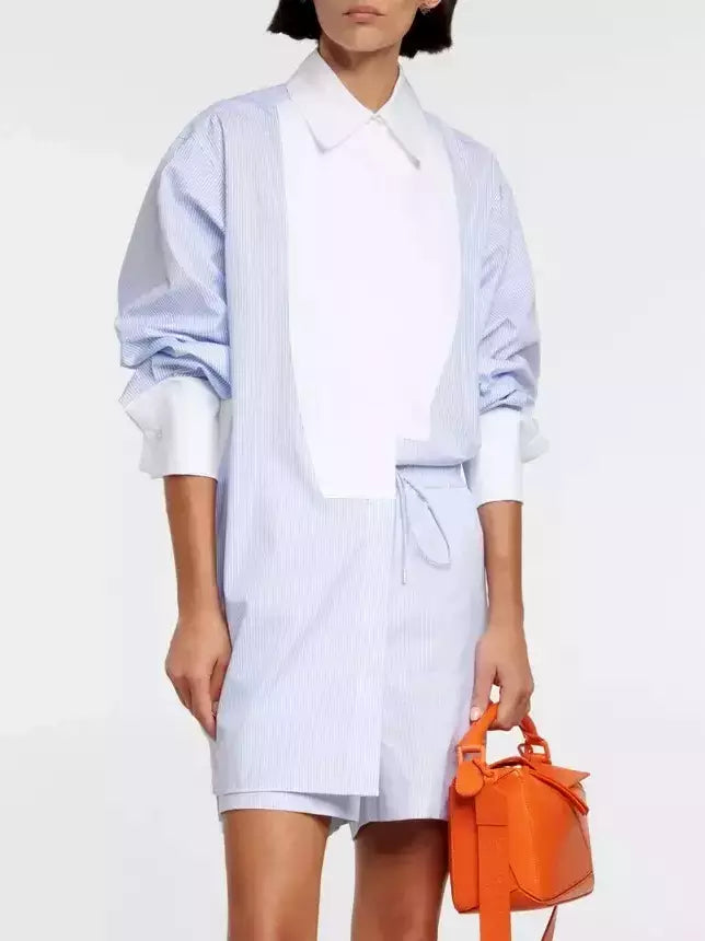 Blue and white pinstripe cotton shirt dress paired with an orange handbag