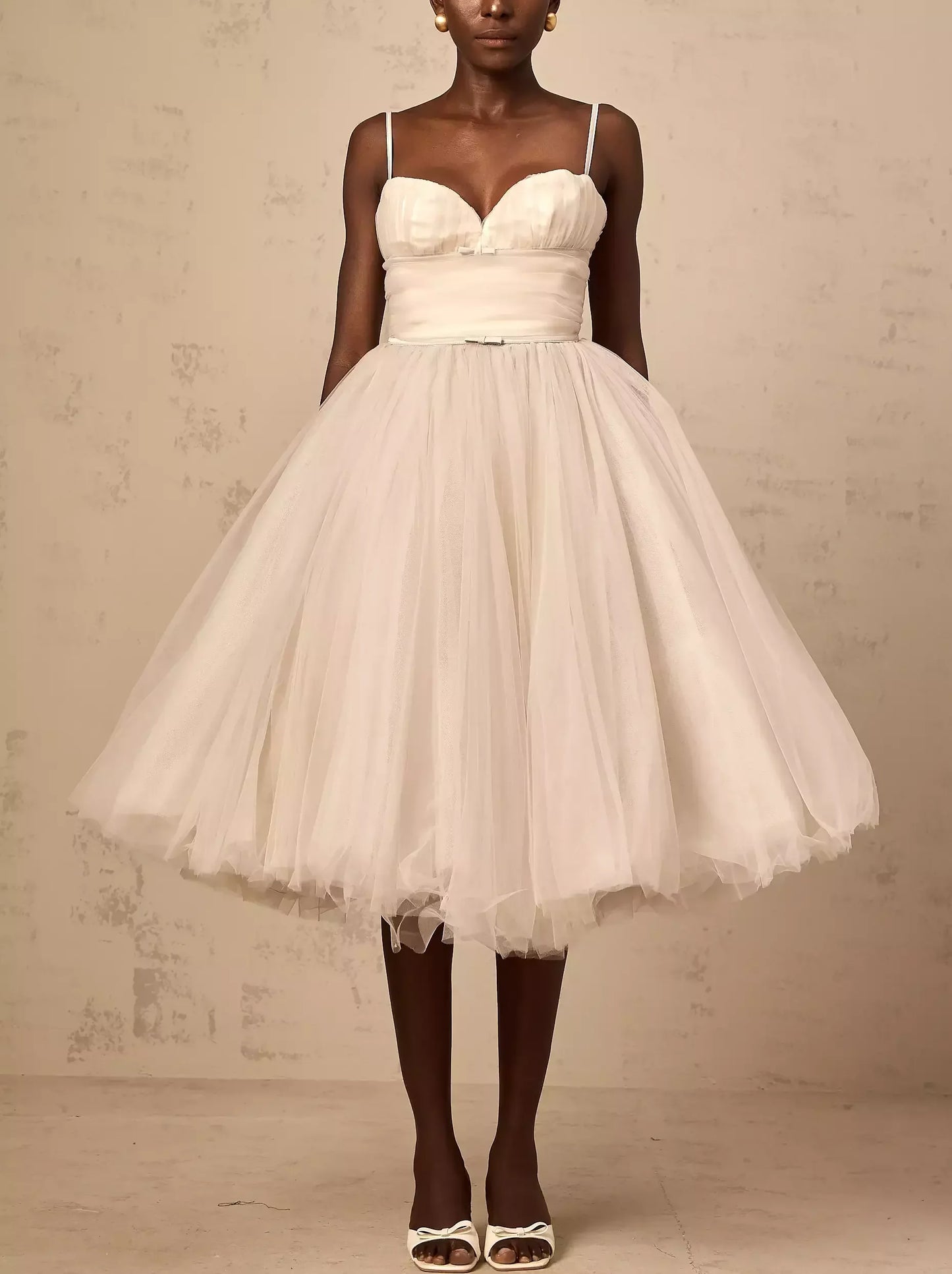 White Bow-Detail Sleeveless Tulle Flared Midi Dress perfect for elegant occasions