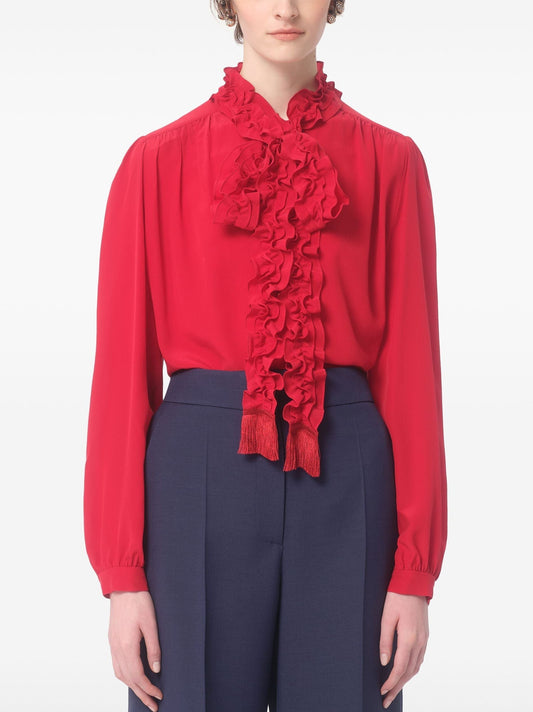 Bright Red Ruffled Collar Fringed Tie-Neck Shirt styled with navy pants for a chic look