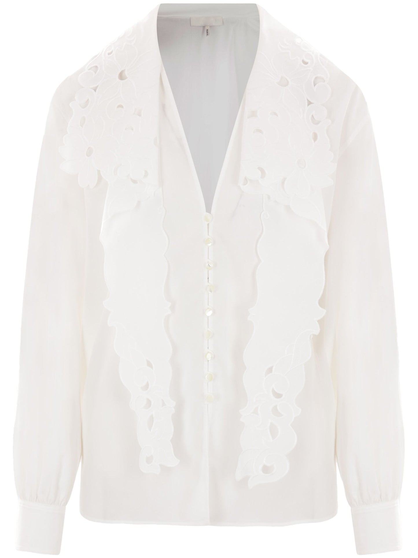 White Anglaise Cotton Poplin Blouse paired with high-waisted jeans for a stylish look