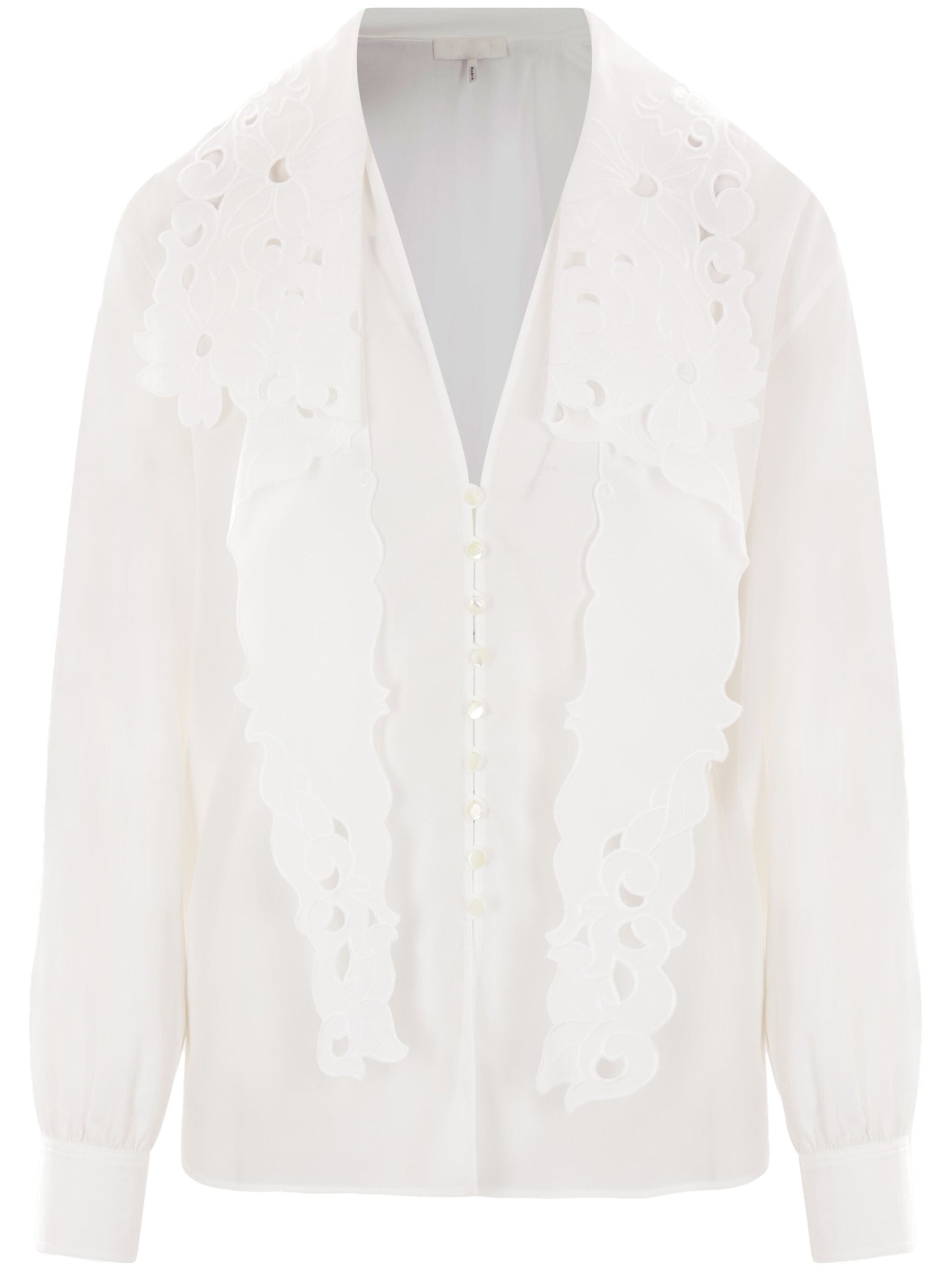 White Anglaise Cotton Poplin Blouse paired with high-waisted jeans for a stylish look