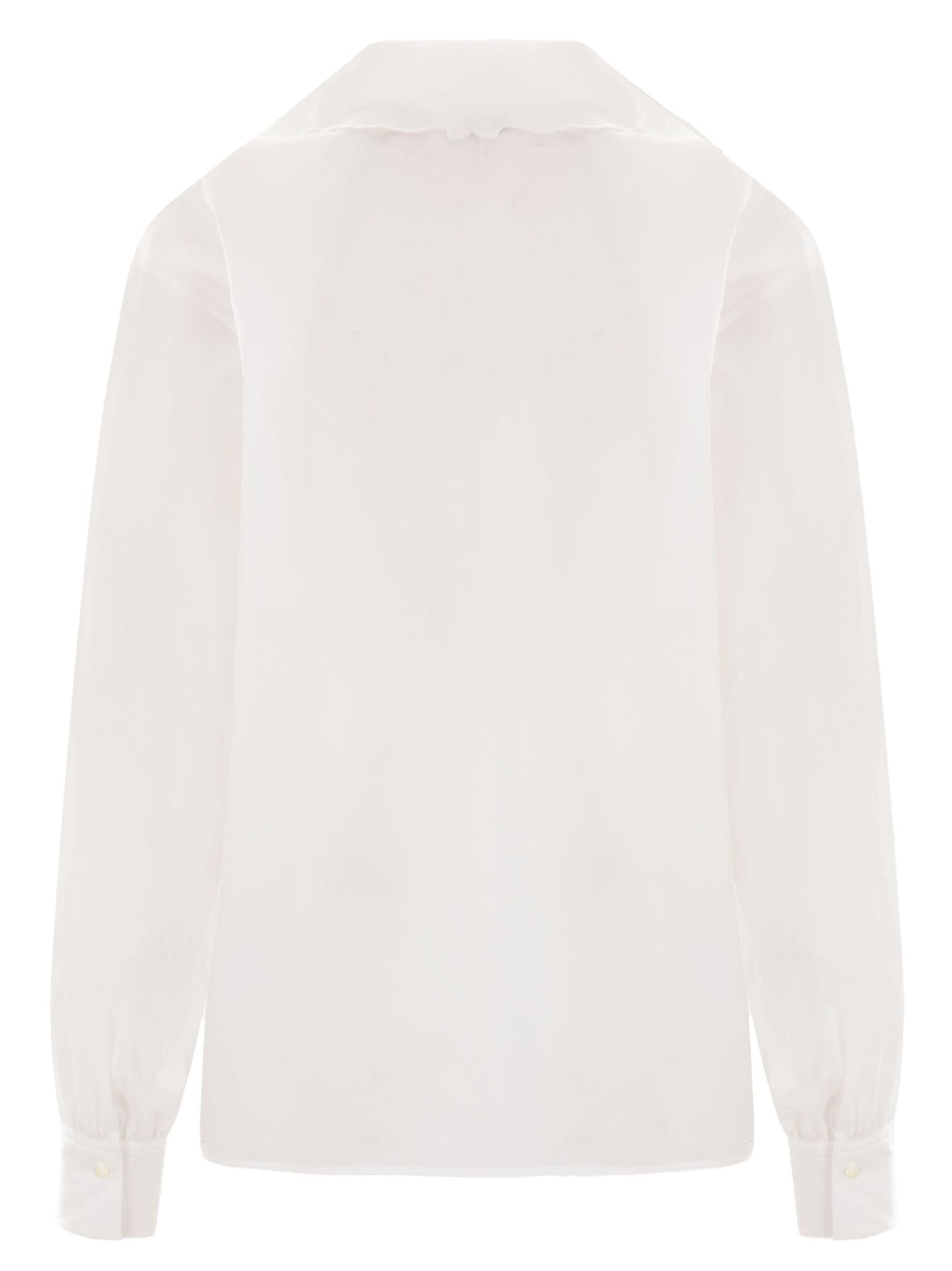 White eyelet-trimmed Broderie Anglaise Cotton Poplin Blouse with high-waisted jeans