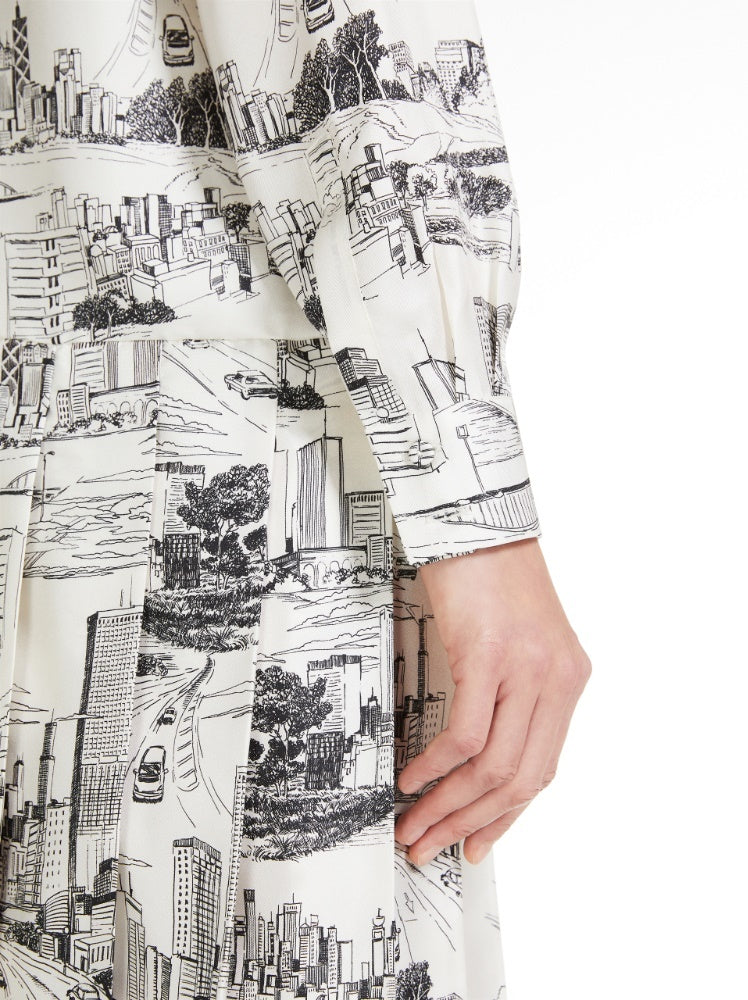 City-Print Silk Mini Dress with Neck Tie featuring a pleated skirt and long sleeves