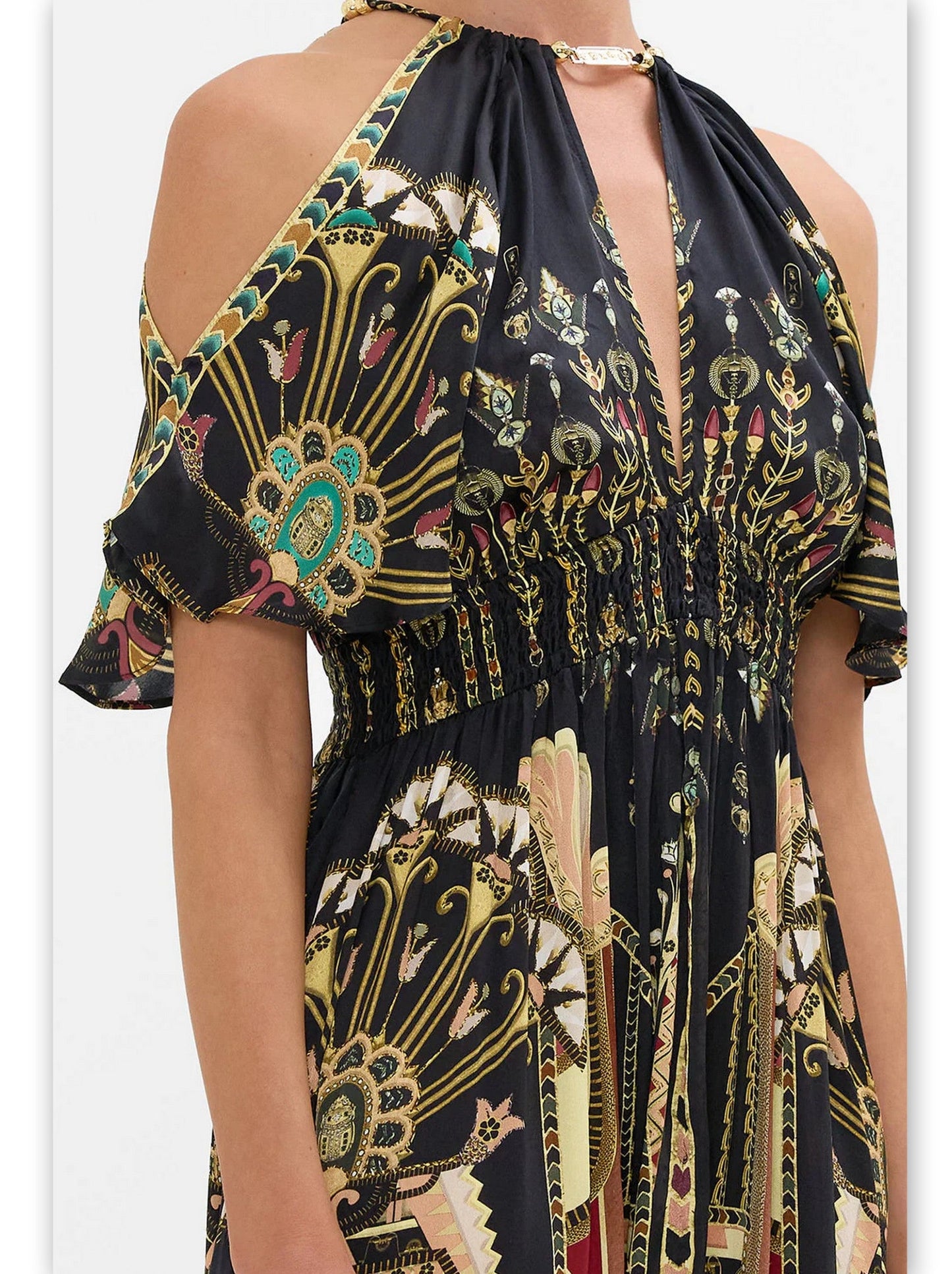 Black patterned maxi dress featuring cold-shoulder design and stylish neck piece