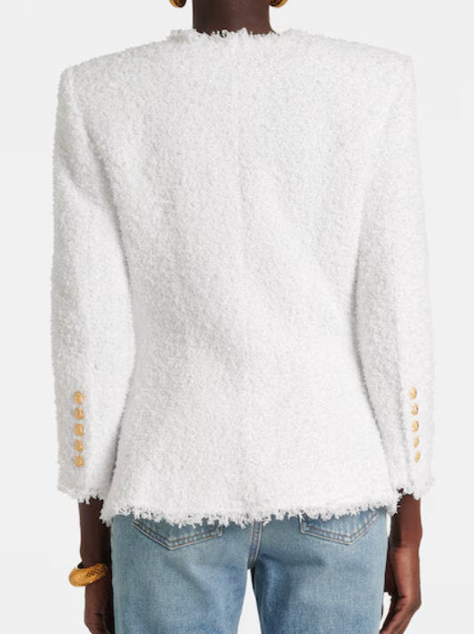 Collarless wool-blend white tweed jacket showcasing stylish design and elegant texture