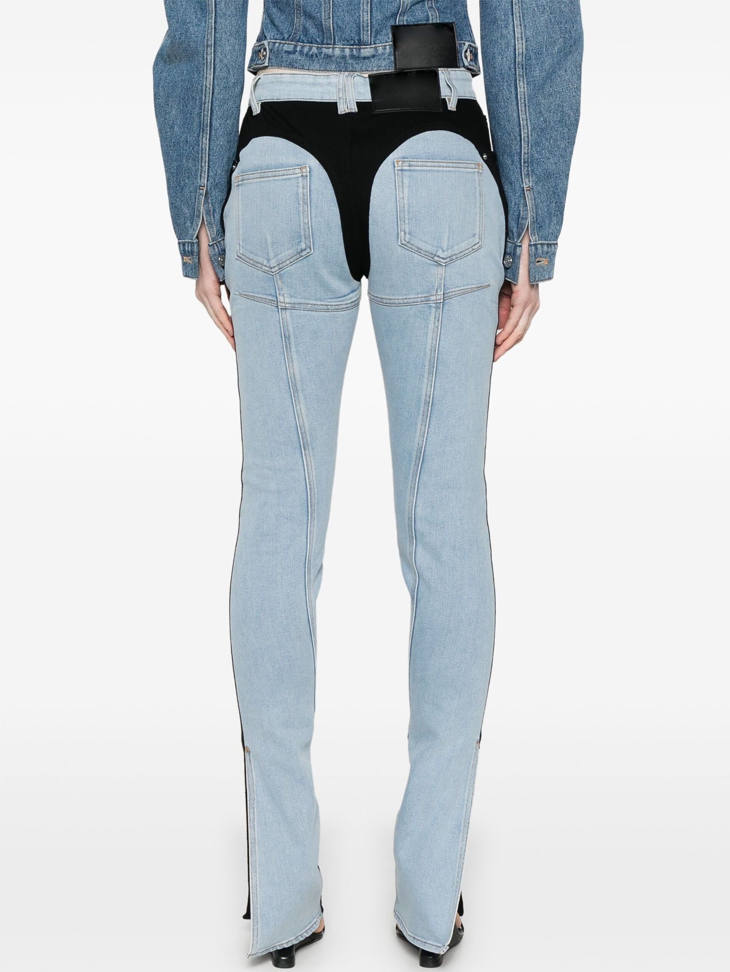Light blue denim chaps featured on Color-Block Skinny Jeans for a stylish look