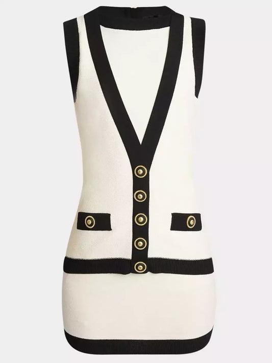 Sleeveless cream knit mini dress with black trim and gold buttons for stylish elegance