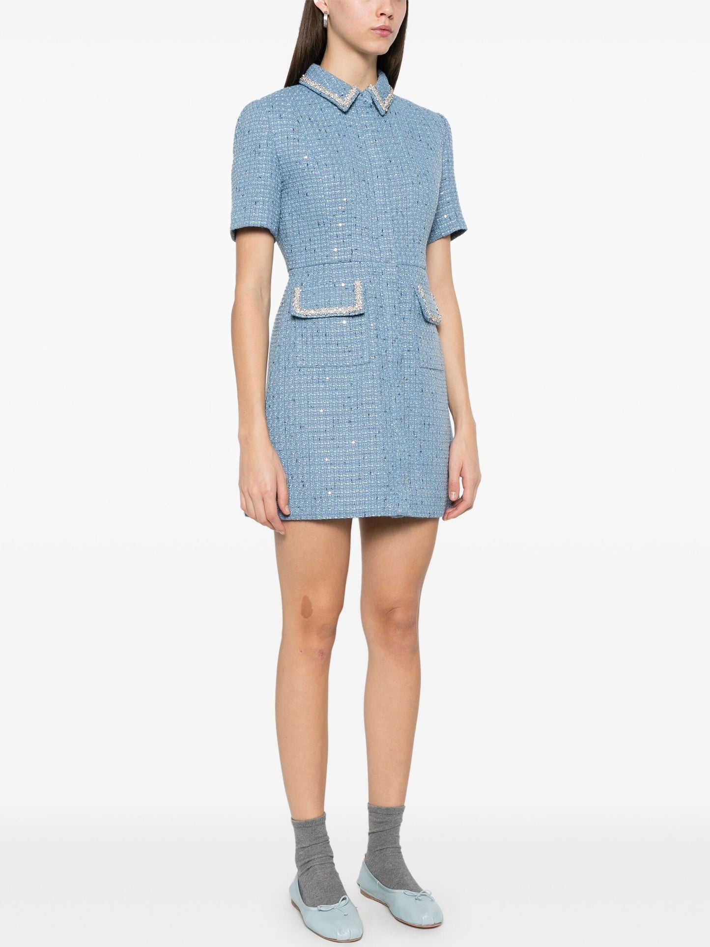 Blue tweed mini dress featuring crystal embellishments and sequins for a stylish look