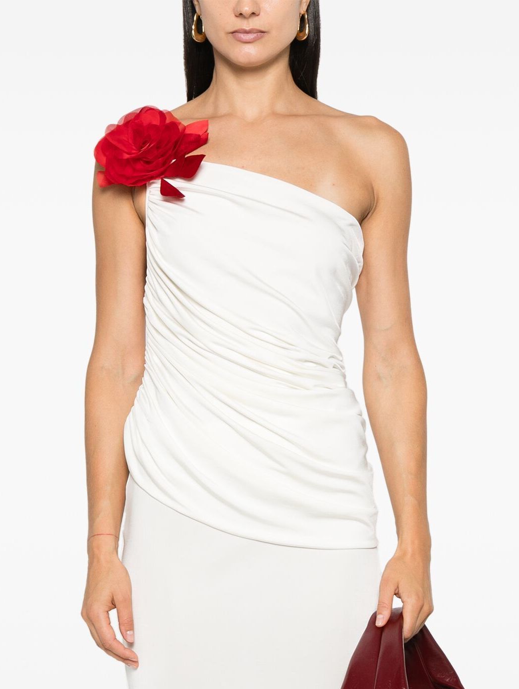 White one-shoulder Draped Jersey Top featuring a detachable rose brooch in red