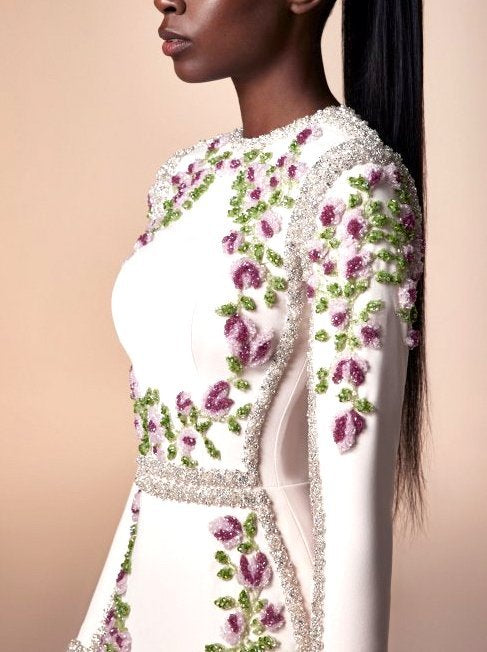 Elegant floral bead-embellished long white fitted gown with stunning floral details