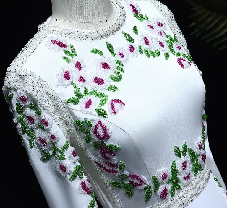 Elegant floral bead-embellished long white fitted gown with stunning embellishments