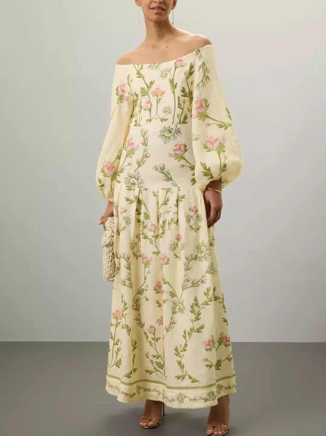 Floral Print Off-The-Shoulder Linen Maxi Dress showcased on a model outdoors