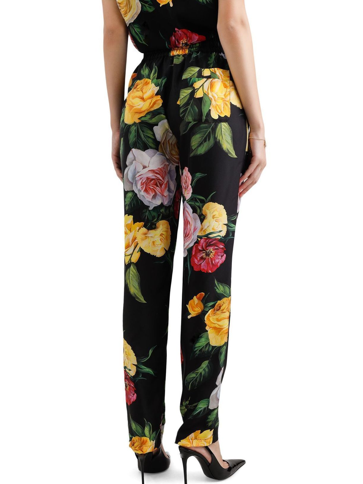 Floral print silk tie-waist pants featuring a stylish drawstring design