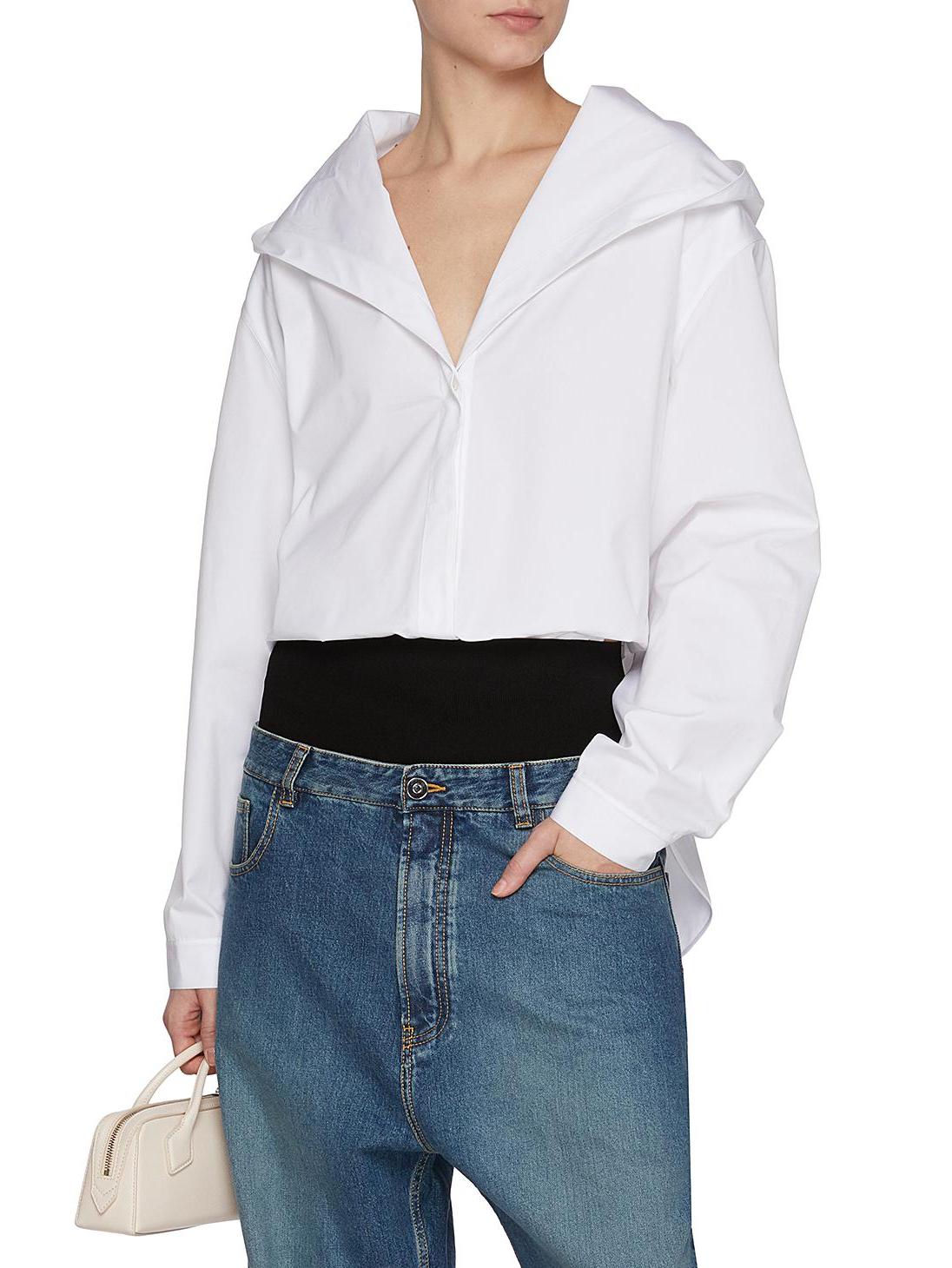 Hooded cotton-poplin white shirt styled with blue jeans for a casual look