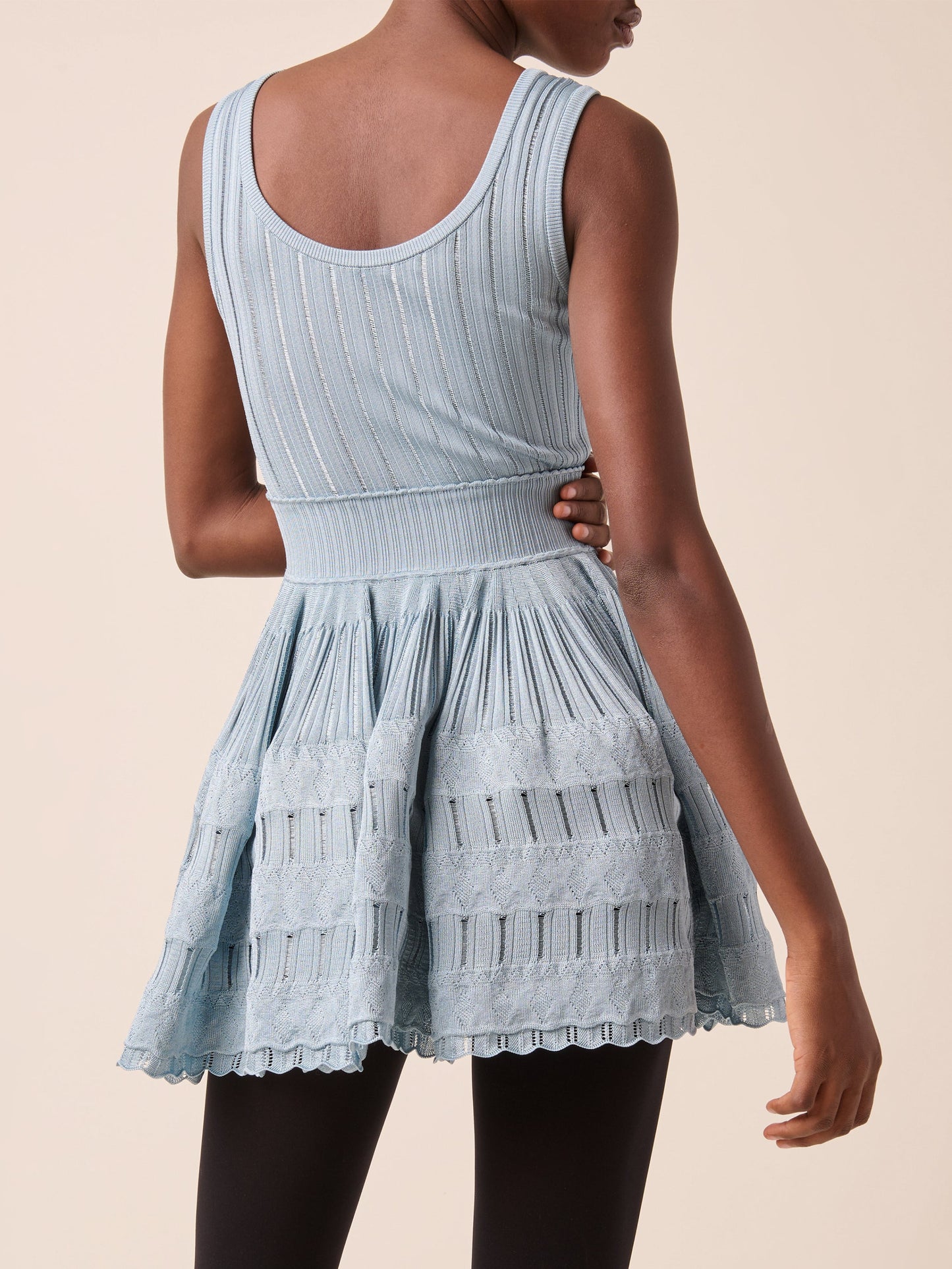 Light Blue Knit Fit and Flare Skater Tank Dress showcasing stylish design and comfort