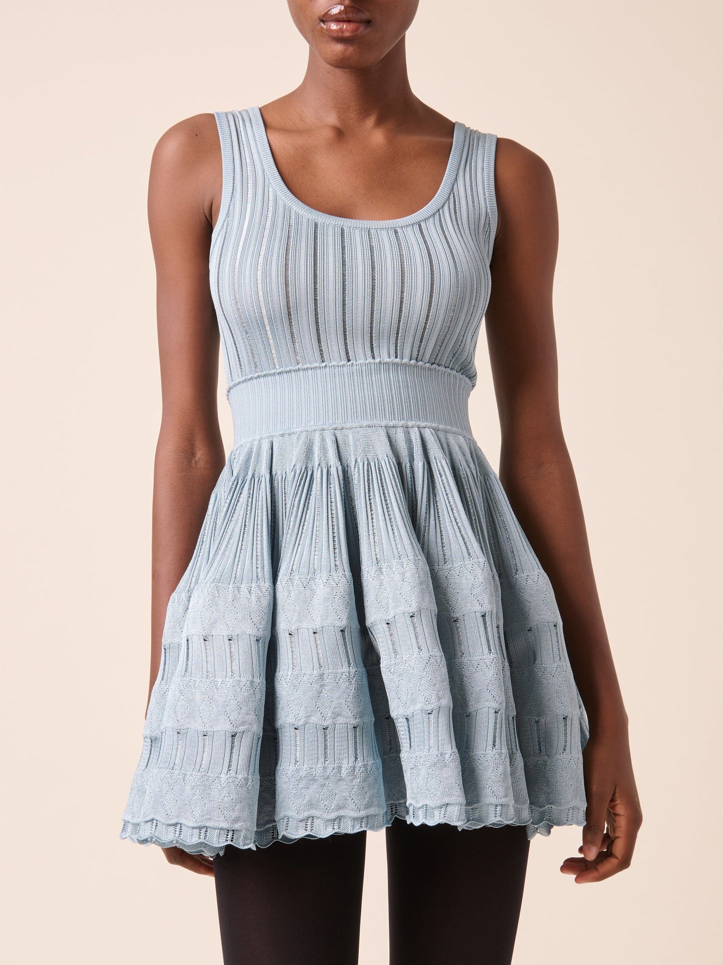 Light Blue Knit Fit and Flare Skater Tank Dress showcasing stylish design and comfort