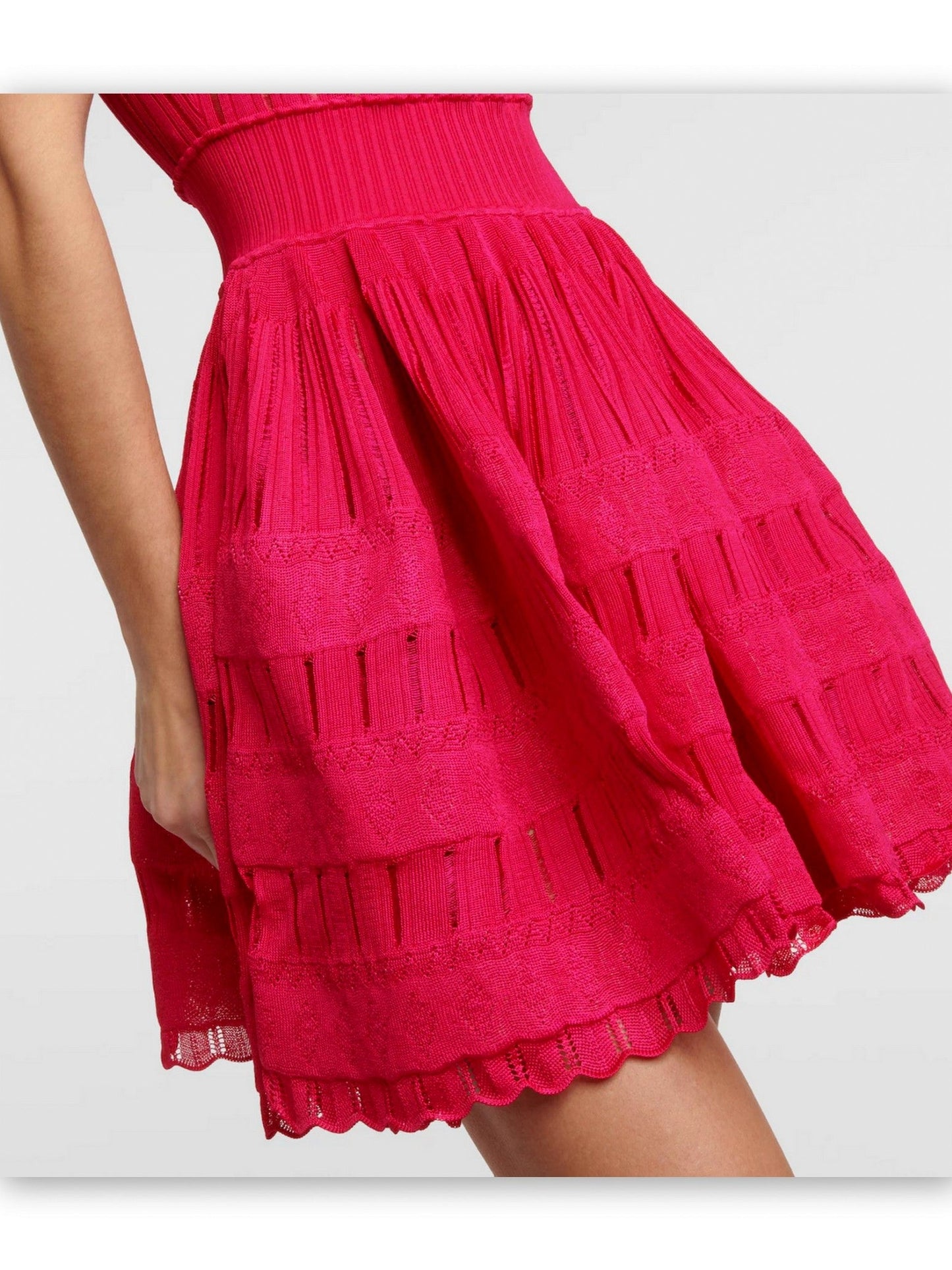 Pink tiered mini dress styled as a flare skater tank in Raspberry Red