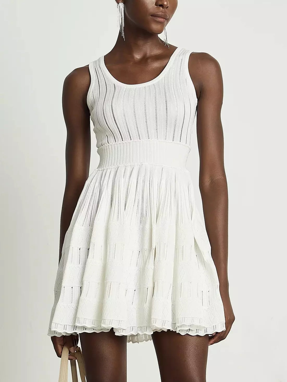 White sleeveless Knit Fit and Flare Skater Tank Dress showcasing elegant style