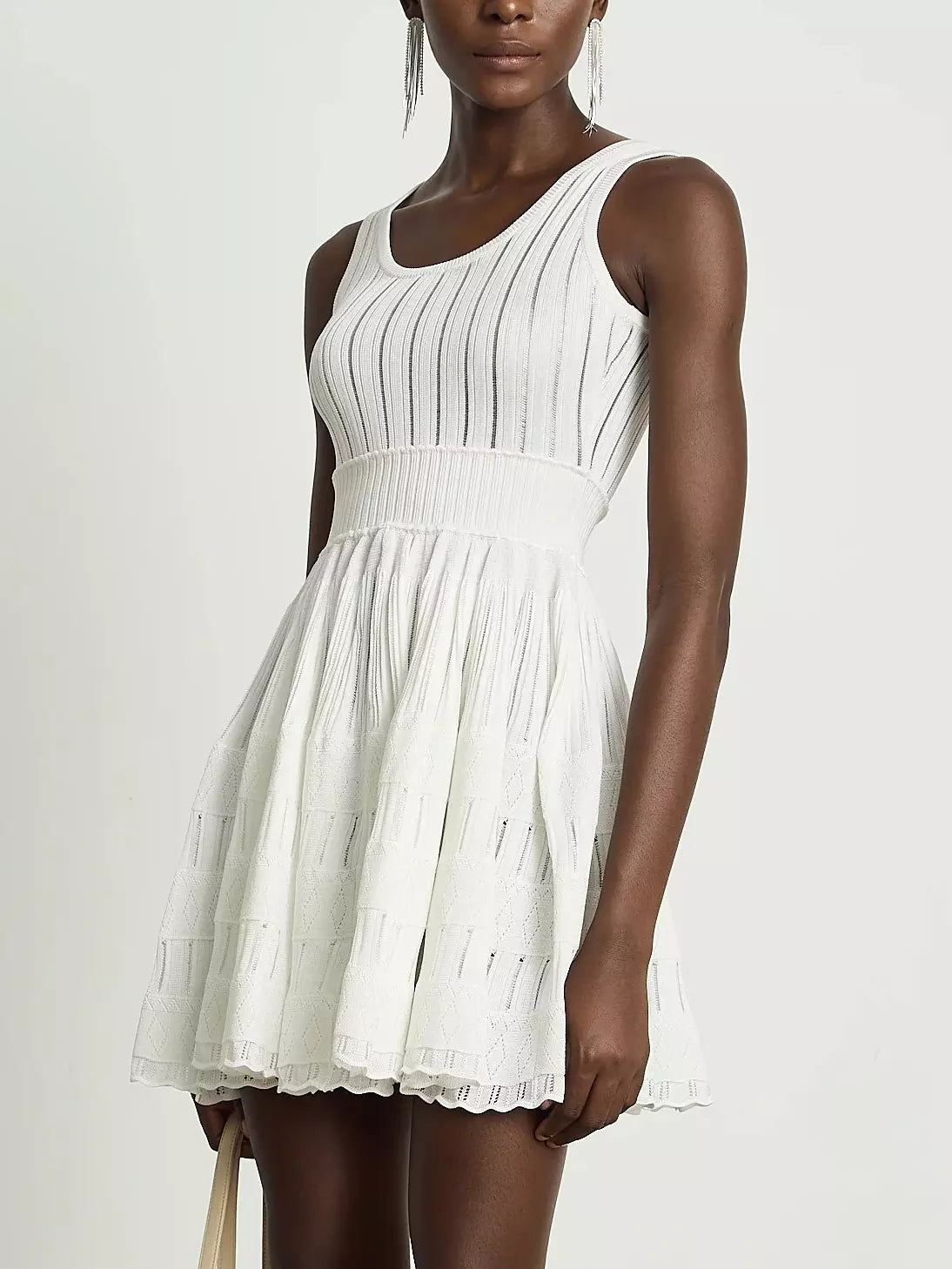 White sleeveless Knit Fit and Flare Skater Tank Dress showcasing stylish design