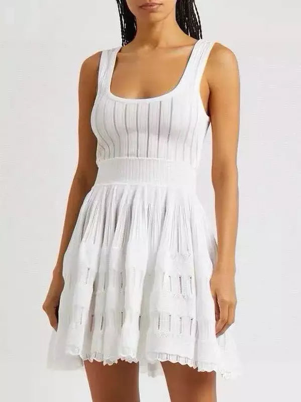 White sleeveless knit fit and flare skater tank dress showcased in elegant fashion