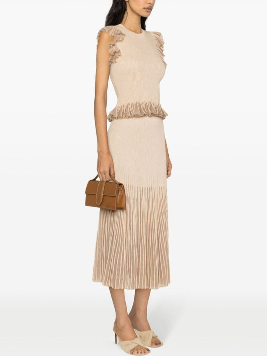 Beige knit ruffled glitter lurex dress paired with a stylish brown handbag