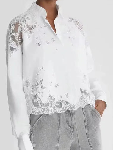 White cotton shirt with lace trim, showcasing the Lace Paneled Cropped design