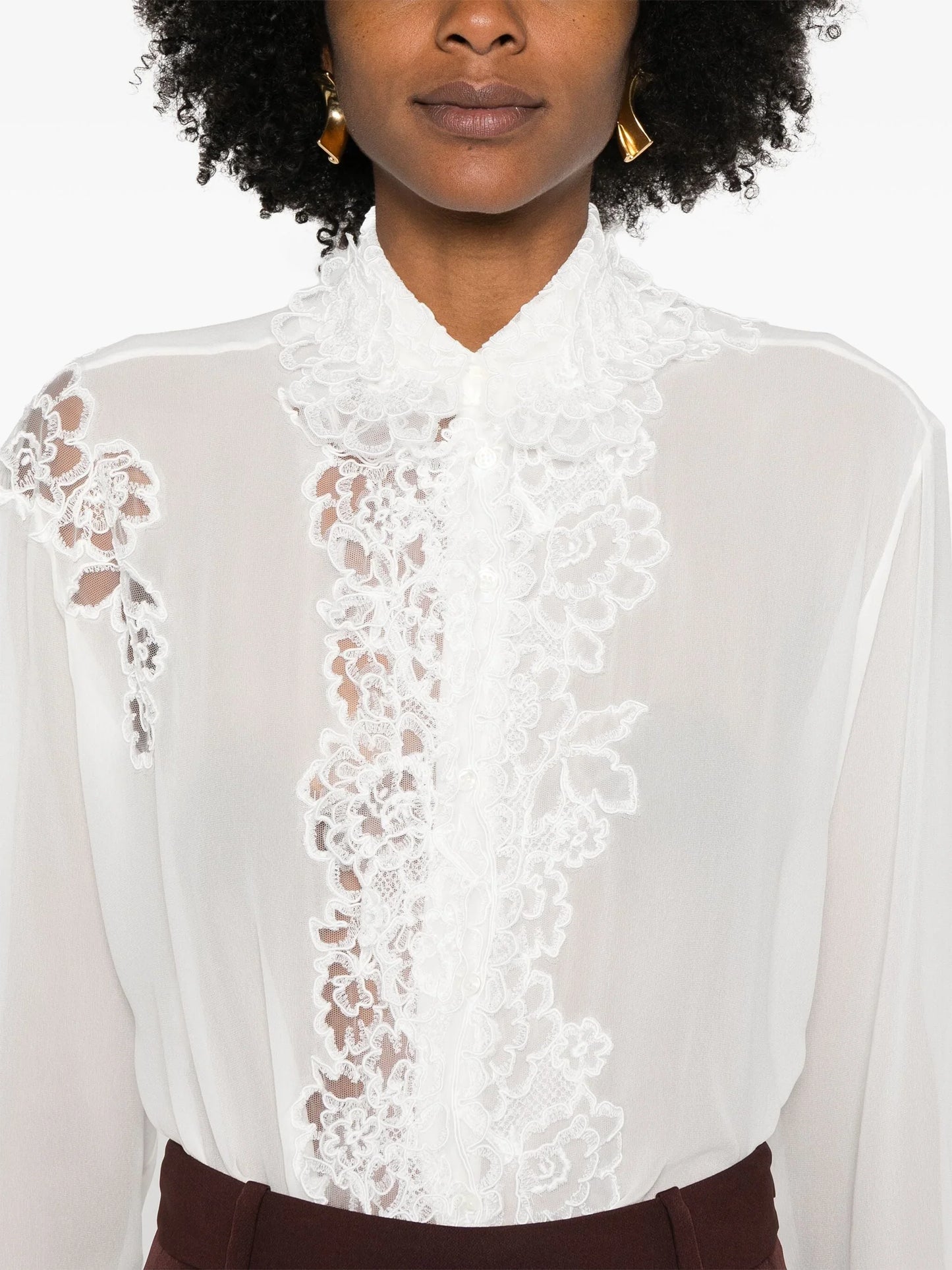 White lace-trimmed blouse featured in Lace Paneled Silk White Shirt design
