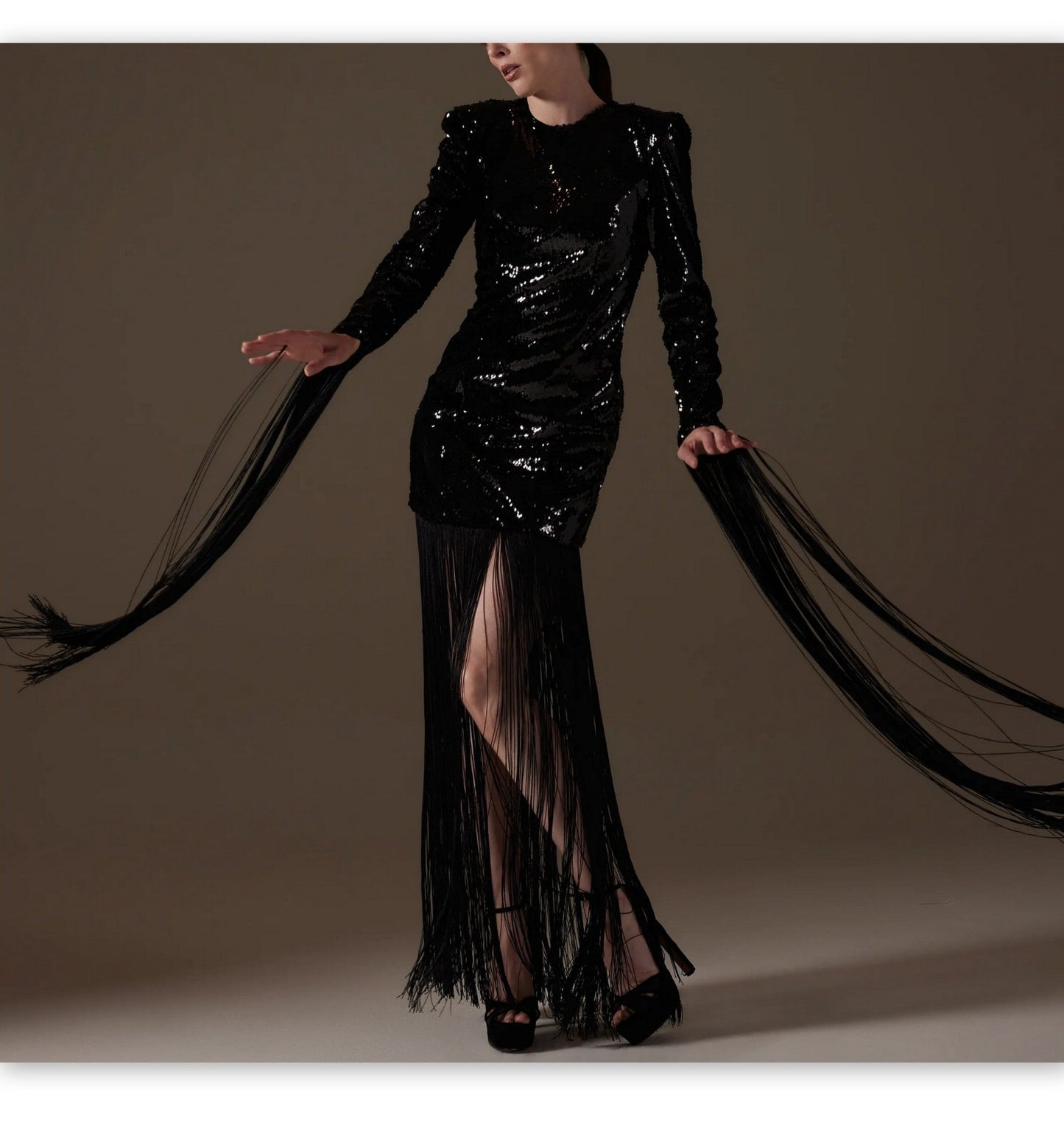 Stunning Long Black Fringed Sequin Dress featuring fringe detailing and sequin embellishments