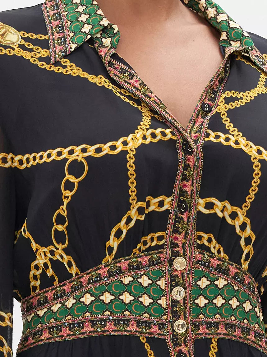 Long Printed Silk Shirt Dress with Fitted Waist featuring a Black Dress and Gold Chain Print