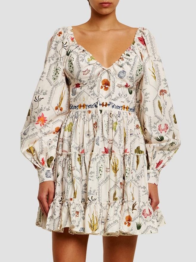 Floral long puff sleeve printed mini dress with adjustable v-neck drawstring detail