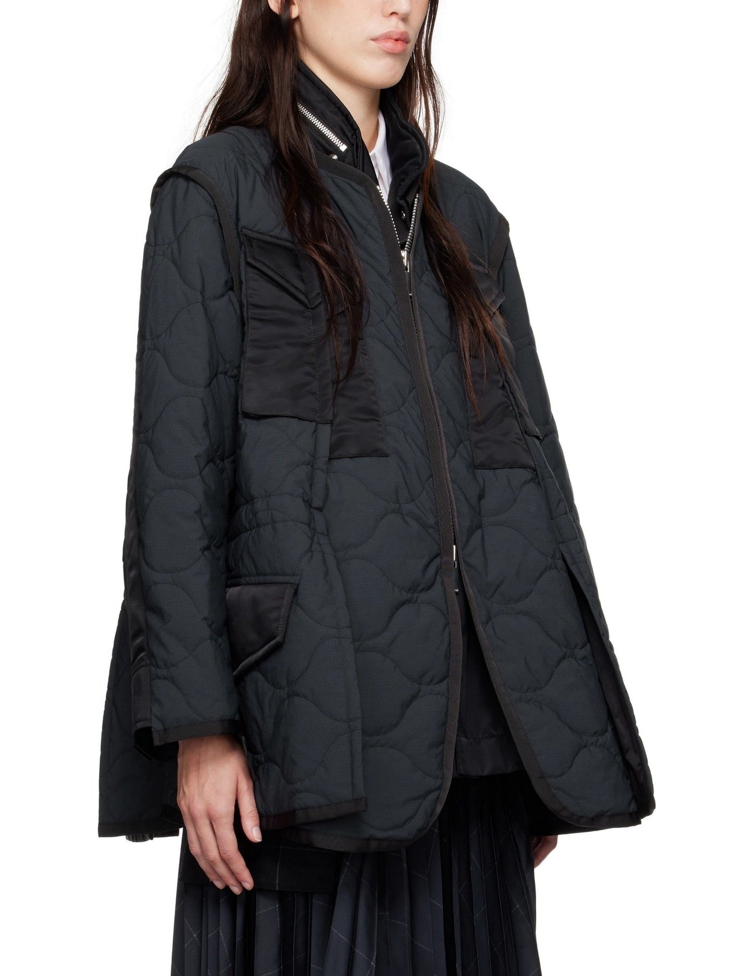Black quilted jacket featuring a stylish paneled quilted two-tone design in Navy