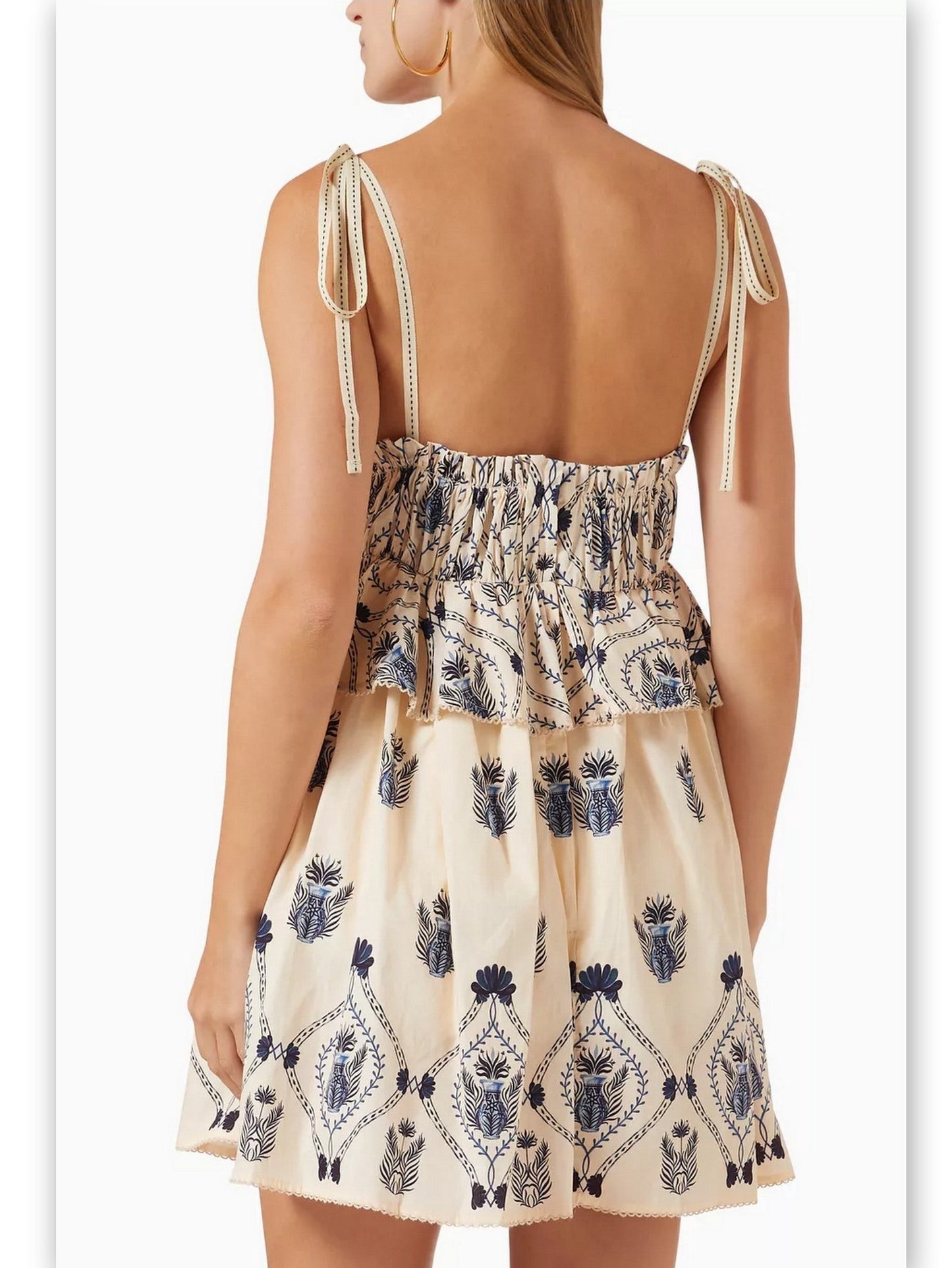 Ivory and blue embroidered Printed Cotton-Poplin Peplum Mini Dress displayed neatly
