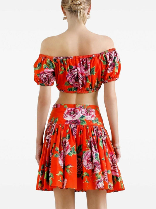 Red floral two-piece skirt set from Branna Couture in luxury women’s apparel