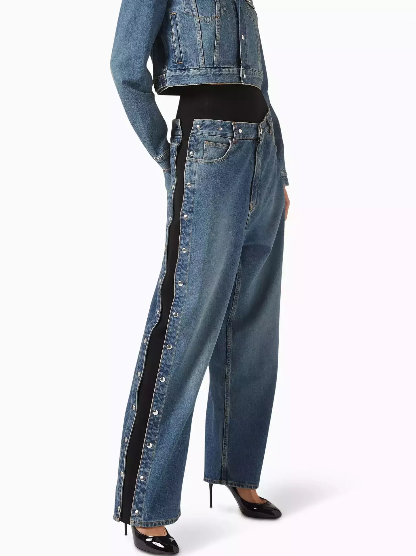 Wide-leg denim pants with buttoned side stripes, perfect for studded jersey-trimmed high-rise style