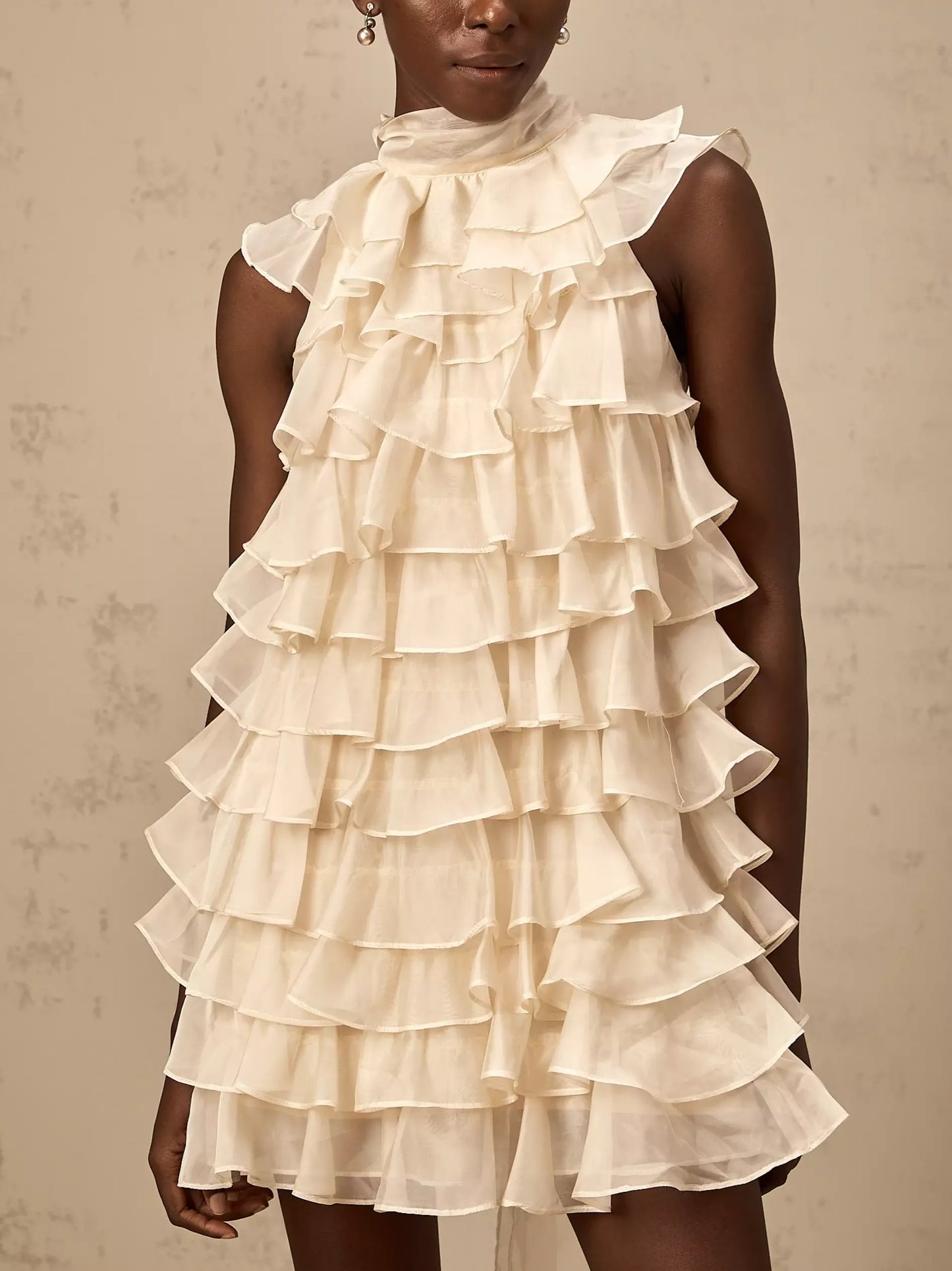 Cream-colored Tie-Neck Tiered Organza Ruffle Mini Dress with a large bow