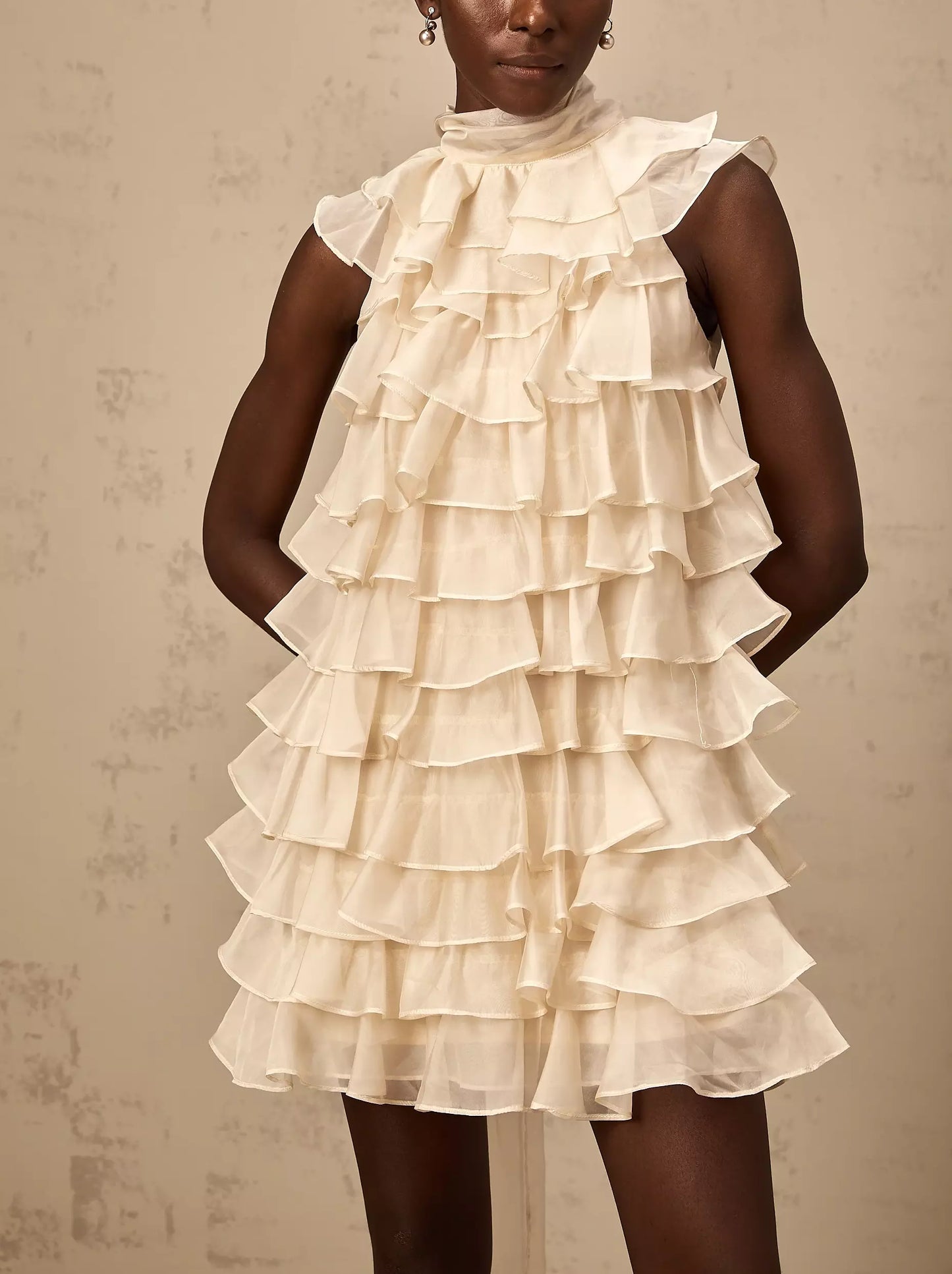 Cream-colored Tie-Neck Tiered Organza Ruffle Mini Dress in Light Beige with bow