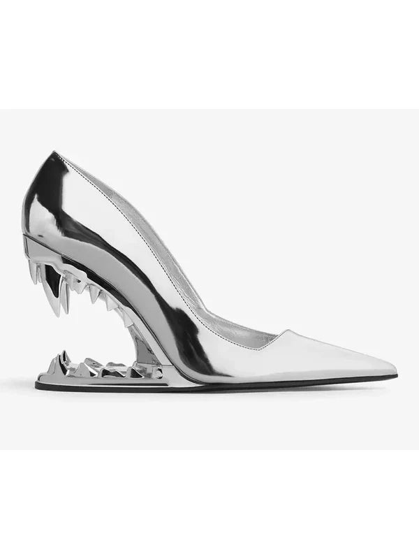 Metallic silver high-heeled shoe with sculptural heel, perfect for Branna Couture’s versatile options.