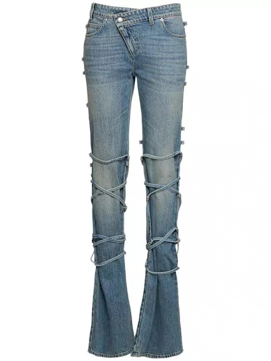 Light blue flared denim jeans with rips featured at Branna Couture for perfect fit.